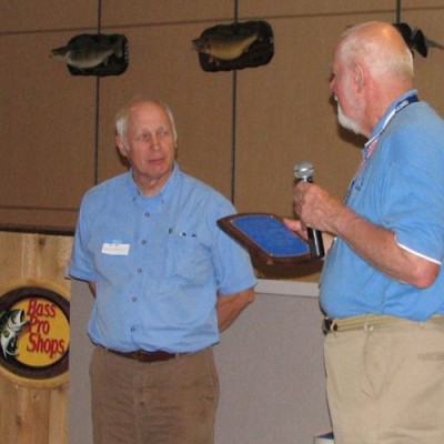John Ruska presenting the 2012 Fran Hanes Award to Jim Engelbrecht.